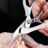 IntelWink Poultry Shears cutting cleanly through chicken bone with curved bone notch