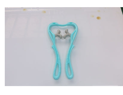 Cyan blue manual neck massager with thumb-shaped silicone pressure nodes