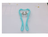 Cyan blue manual neck massager with thumb-shaped silicone pressure nodes