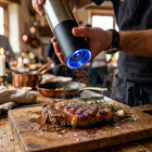 IntelWink Electric Gravity Pepper Mill Automatic Blue LED Spotlight Seasoning Grilled Steak on Cutting Board
