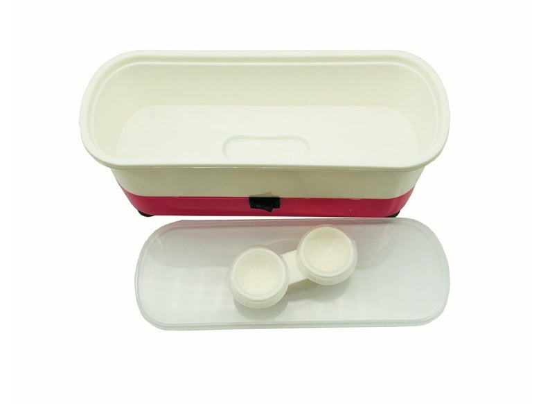 Ultrasonic cleaner open water tank showing dual-cup contact lens cleaning basket