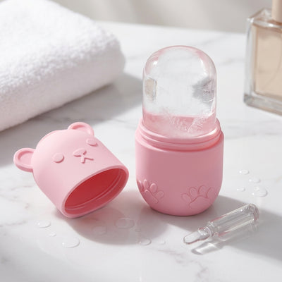 IntelWink Cryo Facial Ice Roller opened to reveal crystal-clear ice contouring cylinder on luxury