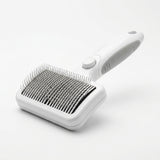White self-cleaning pet slicker brush for cats and dogs - hero studio view